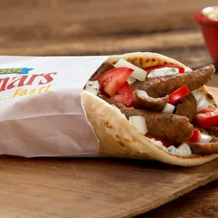 a pita with meat and vegetables