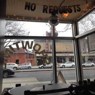 No requests sign above the DJ booth!
