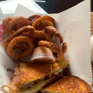 Meh onion rings and grilled cheese w ham