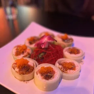 a plate of sushi on a table