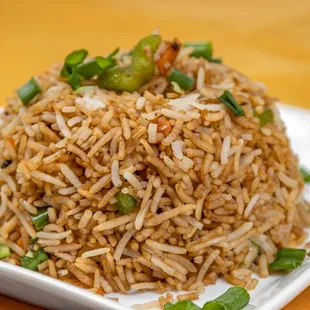 a close up of a fried rice dish