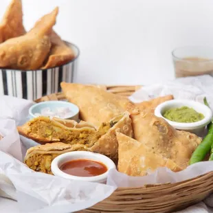 a basket of food and a cup of coffee
