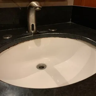 Dirty Bathroom Sink, there&apos;s A ring of mold at the top of the Undermount sink.