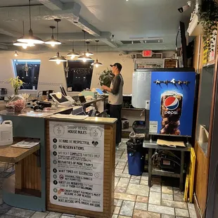 a man preparing food in a restaurant