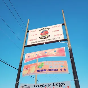 a sign for turkey legs sold here