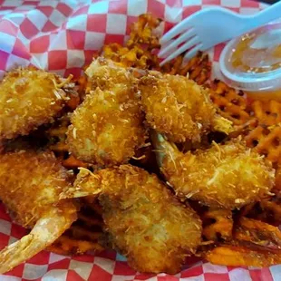 Coconut shrimp basket with orange marmalade.  Delicious and packed with flavor.