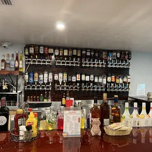 a bar with bottles of liquor