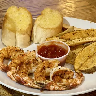 Grilled shrimp   with fresh cut fries  Perfectly seasoned shrimp that is fresh from the Gulf. The bread is THE BEST!!!! Seriously