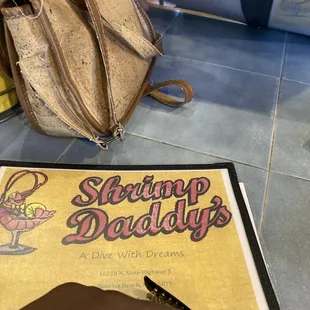 a menu and a handbag