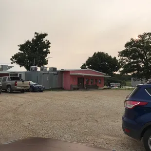 a parking lot with cars parked in it