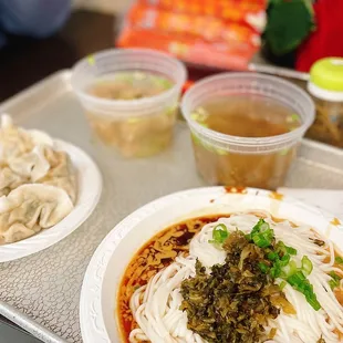 Thick Rice Noodle with Peanut Butter Sauce  （糟菜拌粉干）4A. Pork and Chive dumpling