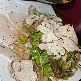 Halibut black truffle carpaccio