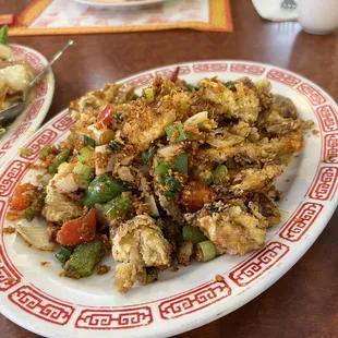 Crispy soft shell crabs with garlic and onions