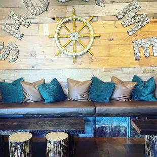 A somewhat private lounge area between the front porch &amp; the bar- super cute!