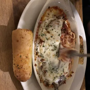 a plate of food with bread and a fork
