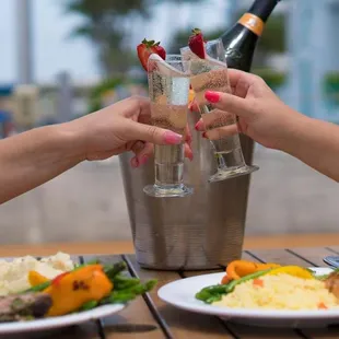 two people toasting