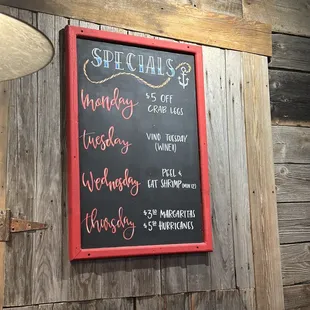 Sign states that margaritas were $3.50 on Thursday.