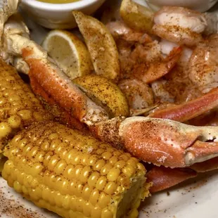 crab legs and corn on the cob