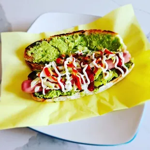 a hot dog with toppings