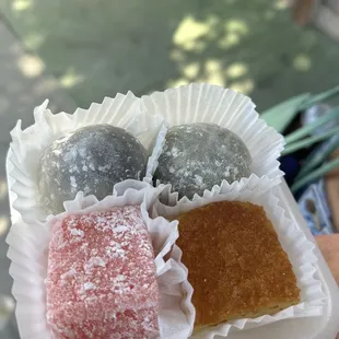 Butter mochi (brown)  chi chi dango strawberry (pink) green tea (top right) Most popular? We forgot (Top left)