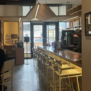 Bar seating near the front.