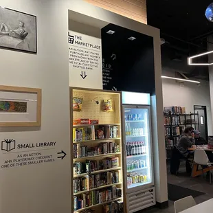 Small library and marketplace- witty commentary on the wall :)
