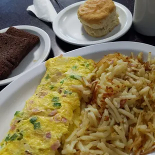 Western omelet, hash browns, liver mush and biscuit.