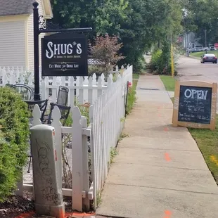 a sign for shug&apos;s