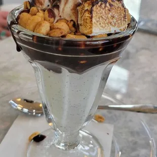 Hot Fudge Sundae (ice cream of your choice, whip cream, a cherry, and peanuts)