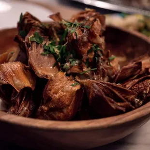 Fried baby artichokes on top of labne, very garlicy, very delicious!