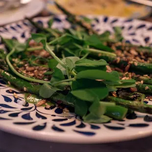 Asparagus appetizer, solid highlighting of artichoke