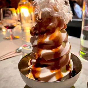 Tahini Soft Serve with halva floss, hazelnut, and pomegranate sauce