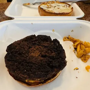 Burnt Shula Burger* that was supposed to be well done. It had cheese on it when I ordered without cheese. This was a to go order.
