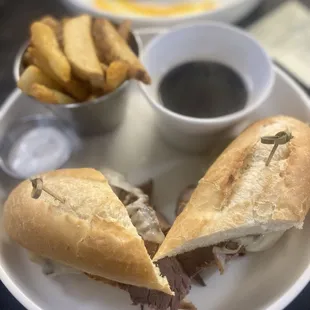 French Dip with Au Jus and steak Fries