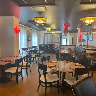 a restaurant with tables and chairs