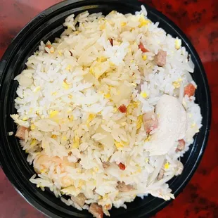 a bowl of rice and chicken