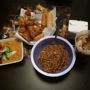 Sesame chicken combo, fried chicken wings, egg rolls, house special chow mein