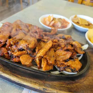 dweji bulgogi (spicy marinated thin slices of pork)...not very spicy...$21 total after tax and tip during lunch