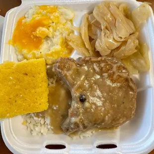 Cheese grits, cabbage, smothered Porkchop, rice and cornbread