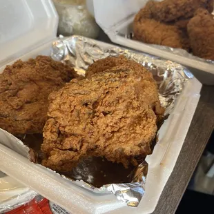 two trays of fried chicken