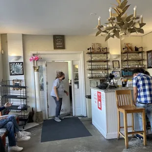 The owner and mom customer picking up to go orders