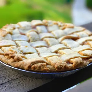 a pie on a wooden table