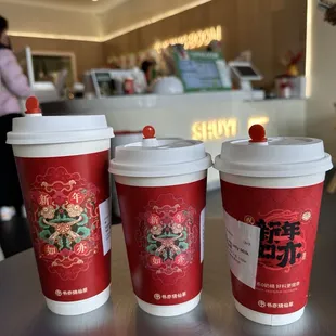 three cups of coffee on a table