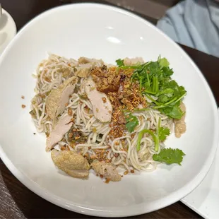 Rice noodles with fish cake.  Very nice and thick flavor 100 % recommend it