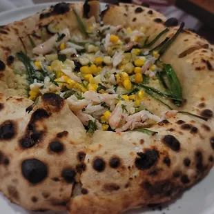 Corn pizza with crab meat and spring onion