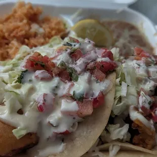 Fish taco plate with rice and beans, not bad. No grilled only option available.