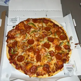 a pepperoni pizza in a box