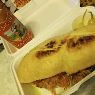 The deluxe sandwich and Sicilian orange soda.