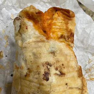 a close up of a burrito