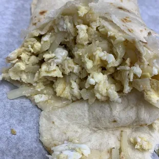 a close up of a burrito